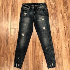 Distressed Mid Rise Ankle Skinny Jeans